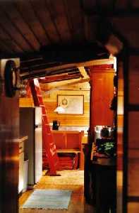 view from floor through kitchen to saloon